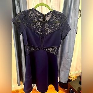 Navy blue lace cut-out express dress, new with tags.